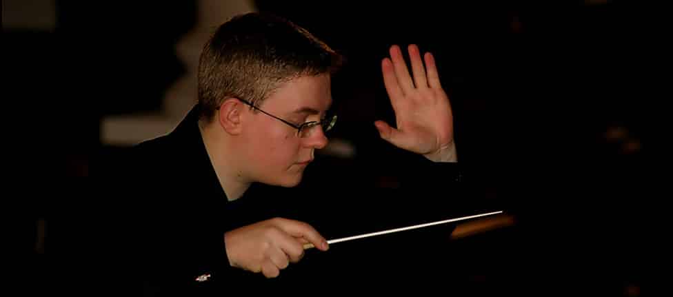Andrew Morley conducting St Paul's Sinfonia in performance
